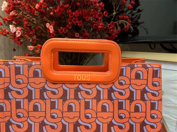 T0US medium shopper amaya coral manifesto 620034